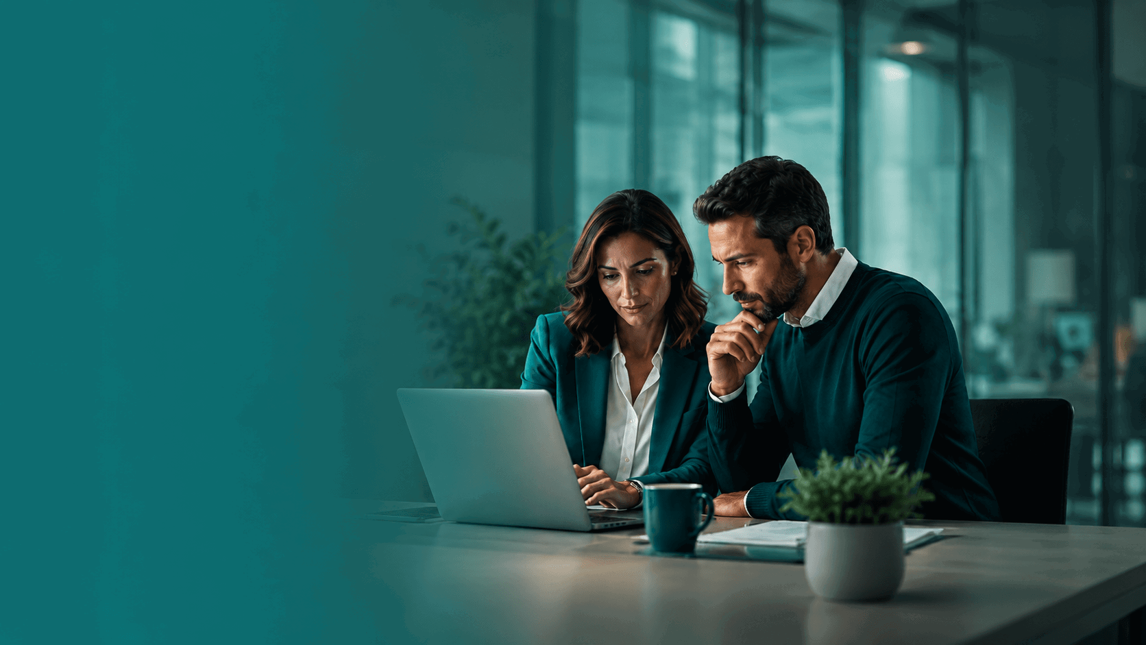 Image Of Two Employees Anxiously Looking At Laptop Green Hue (1)2 3 (1)